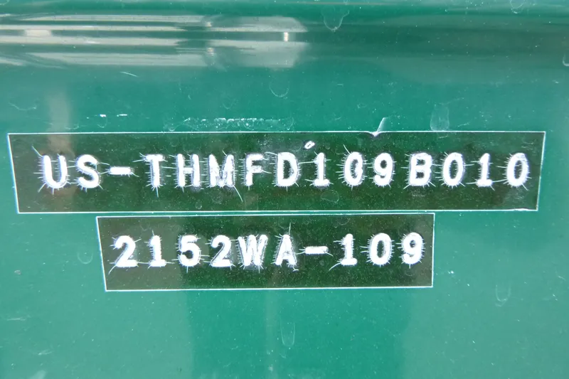 Slide: The Image of 2010 Trophy 2152 Walkaround boat identification numbers on green hull. - 17