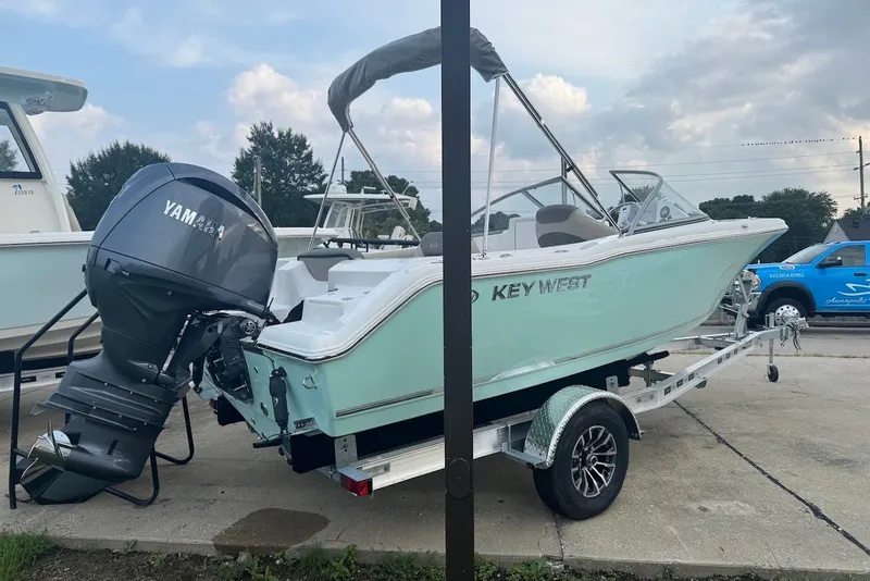 Slide: The Image of 2027 Key West 203 DFS boat on trailer with Yamaha outboard motor. - 4