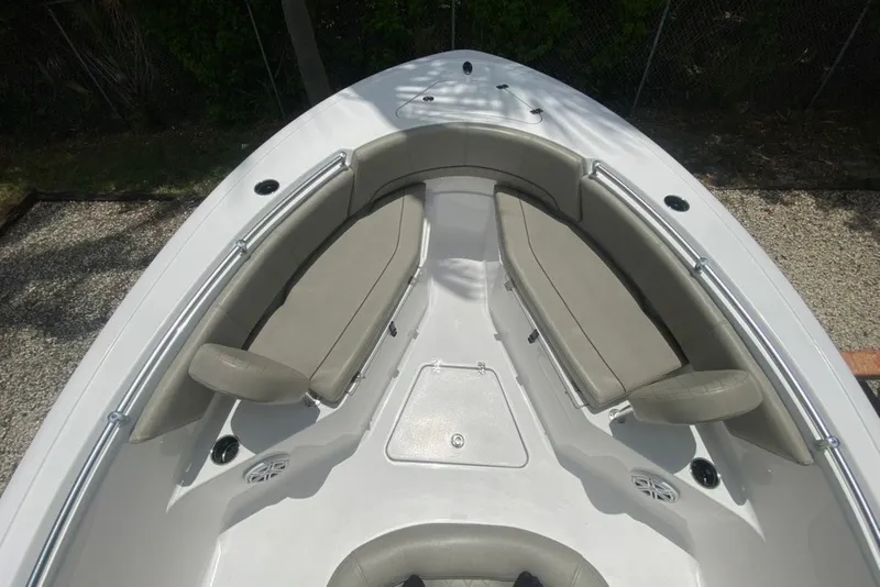 Slide: The Image of 2022 Sportsman Open 232 Center Console boat with spacious seating area. - 23