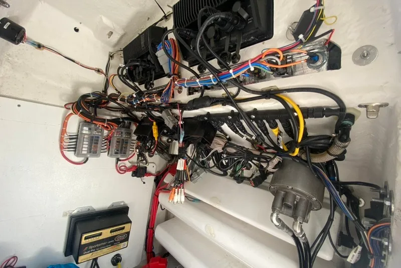 Slide: The Image of 2022 Sportsman Open 232 Center Console wiring and electronics setup. - 29