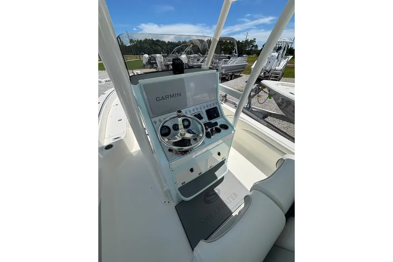 Slide: The Image of 2022 ShearWater 250 XTE boat console with Garmin navigation system. - 7