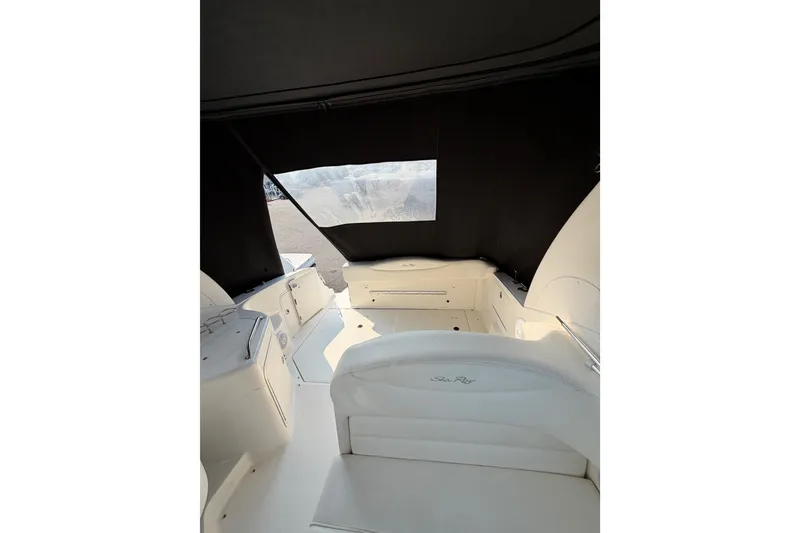 Slide: The Image of Interior view of 2005 Sea Ray Sundancer 280 boat with seating and covered canopy. - 22