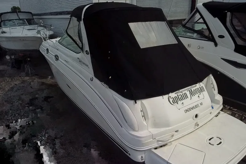 Slide: The Image of 2005 Sea Ray Sundancer 280 boat with black cover, docked in Lindenhurst, NY. - 17