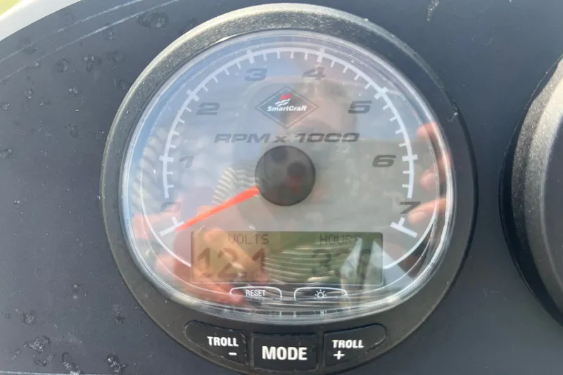 Slide: The Image of Close-up of a SmartCraft RPM gauge on a 2007 Boston Whaler 180 Dauntless boat. - 10