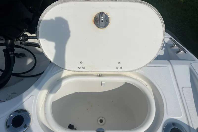 Slide: The Image of Open storage compartment on 2007 Boston Whaler 180 Dauntless boat. - 7