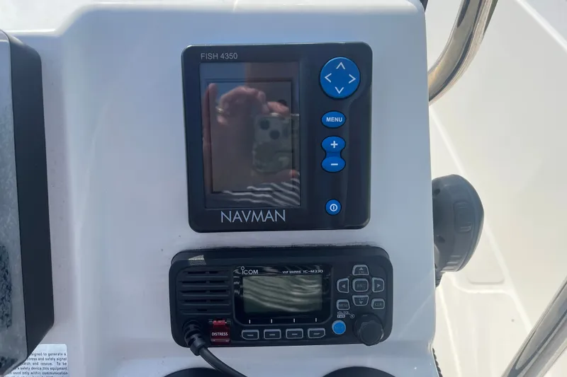 Slide: The Image of Control panel of a 2007 Boston Whaler 180 Dauntless with Navman Fish 4350. - 2