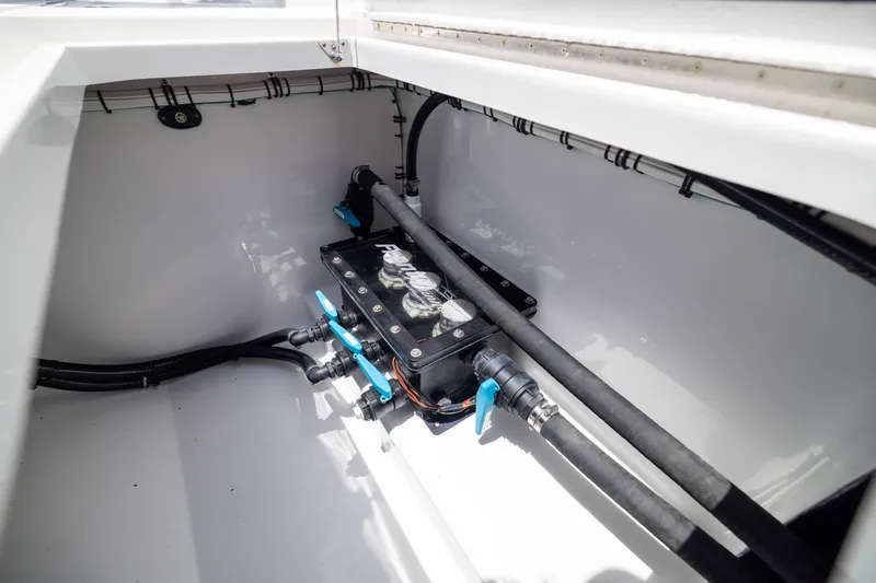 Slide: The Image of Engine compartment of 2026 Front Runner 43 Catamaran, showcasing plumbing and mechanical components. - 60