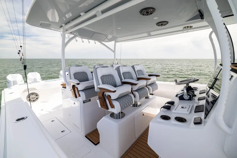 Slide: The Image of Luxurious interior of 2026 Front Runner 43 Catamaran with plush seating and modern controls. - 33