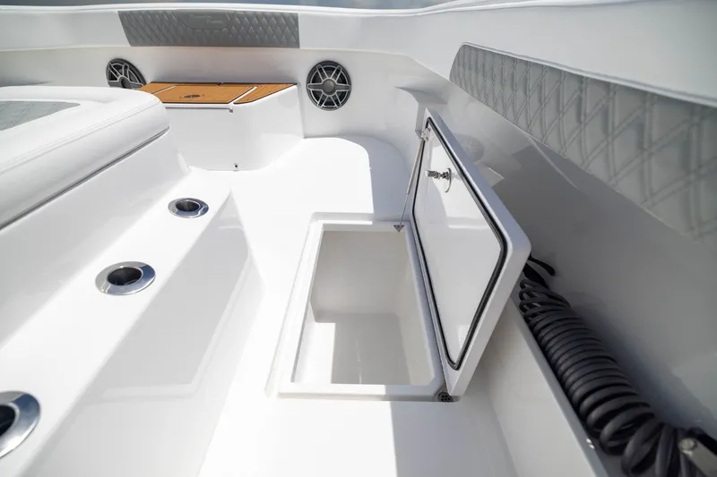 Slide: The Image of Interior view of 2026 Front Runner 43 Catamaran, featuring storage compartment and sleek design. - 20