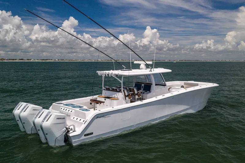 Slide: The Image of 2026 Front Runner 43 Catamaran on open water, featuring dual Mercury engines. - 3