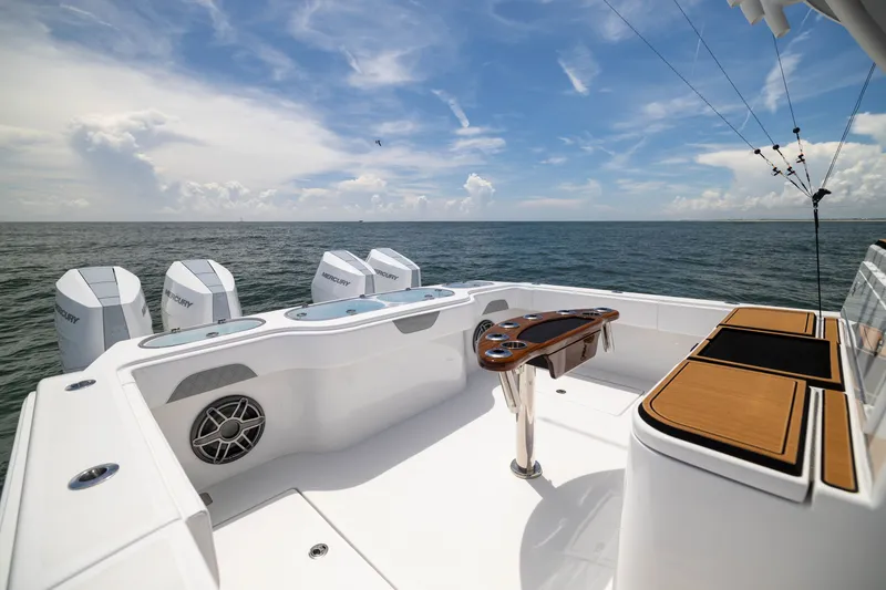 Slide: The Image of Sleek 2026 Front Runner 43 Catamaran with powerful Mercury engines on open sea. - 51