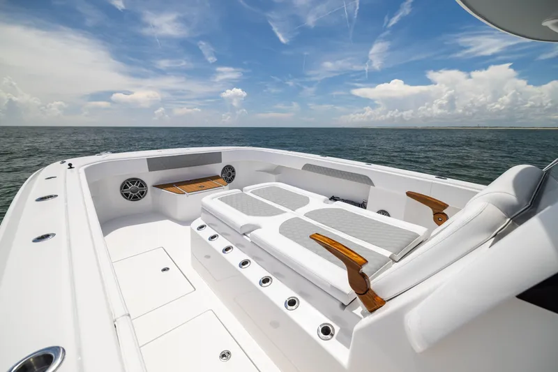 Slide: The Image of Luxurious 2026 Front Runner 43 Catamaran with spacious deck and comfortable seating on open water. - 13