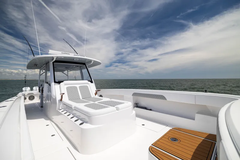 Slide: The Image of 2026 Front Runner 43 Catamaran on open water, showcasing sleek design and spacious deck. - 23
