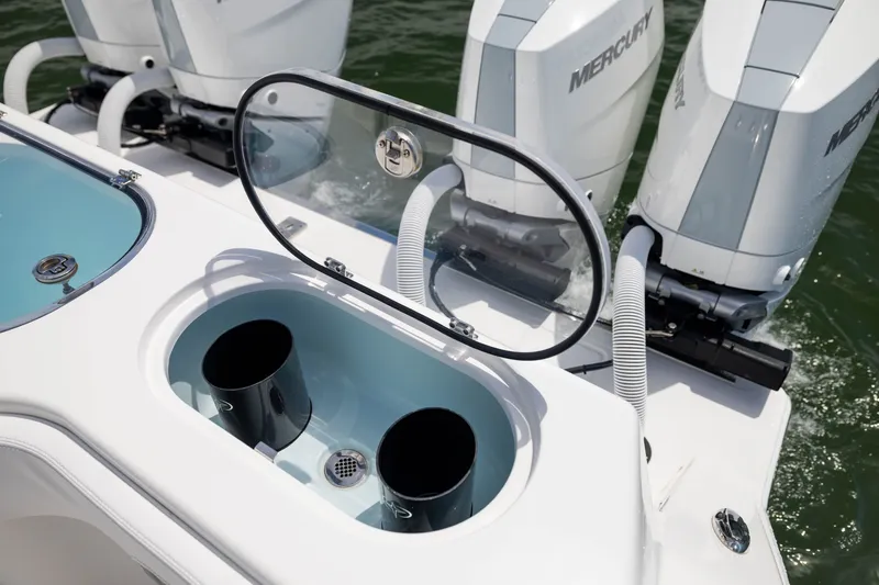 Slide: The Image of 2026 Front Runner 43 Catamaran with Mercury engines and open storage compartment. - 53