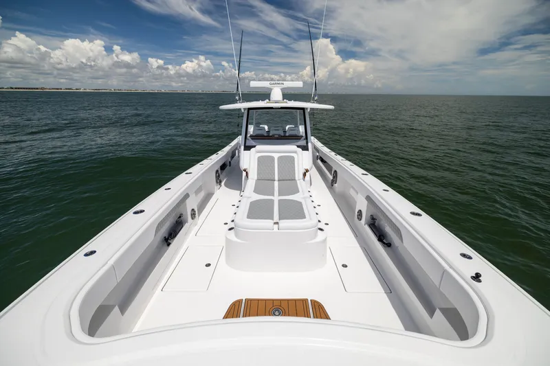 Slide: The Image of Front Runner 43 Catamaran 2026 on open water, showcasing sleek deck design. - 22