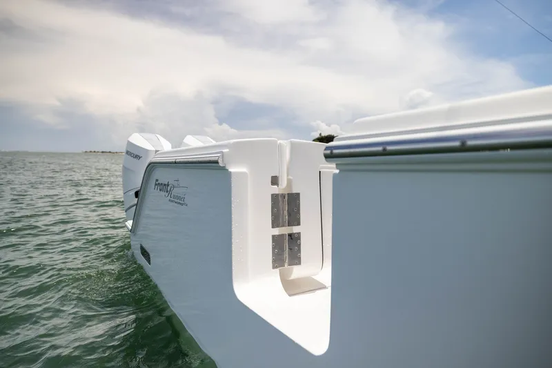 Slide: The Image of Front Runner 43 Catamaran 2026 on water, showcasing sleek design and powerful engines. - 56