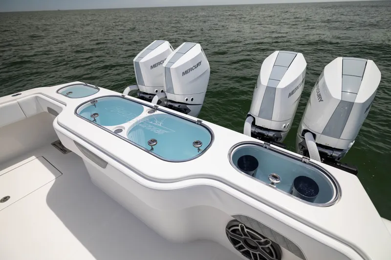 Slide: The Image of 2026 Front Runner 43 Catamaran with Mercury engines, featuring sleek design and ocean backdrop. - 52