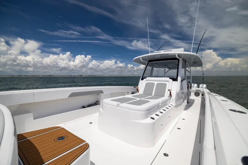 Slide: The Image of 2026 Front Runner 43 Catamaran on open water, showcasing sleek design and spacious deck. - 24
