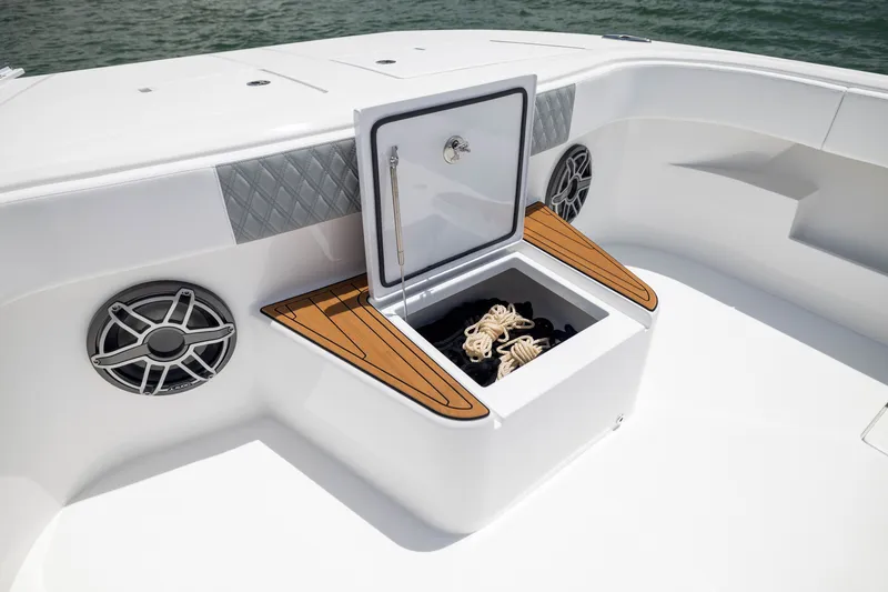 Slide: The Image of Front Runner 43 Catamaran 2026 deck storage with open hatch and marine speakers. - 19
