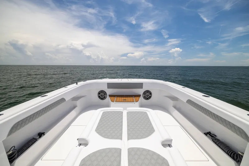 Slide: The Image of Front Runner 43 Catamaran 2026, spacious deck view, open sea, clear sky. - 15