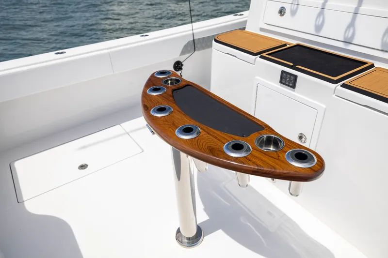 Slide: The Image of Luxury fishing station on 2026 Front Runner 43 Catamaran, featuring rod holders and teak accents. - 44
