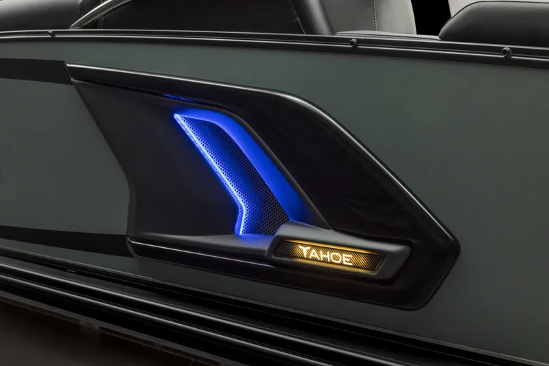 Slide: The Image of 2026 Tahoe Pontoon Grand Tahoe LTD Cruise Rear Bench with illuminated side detail. - 13