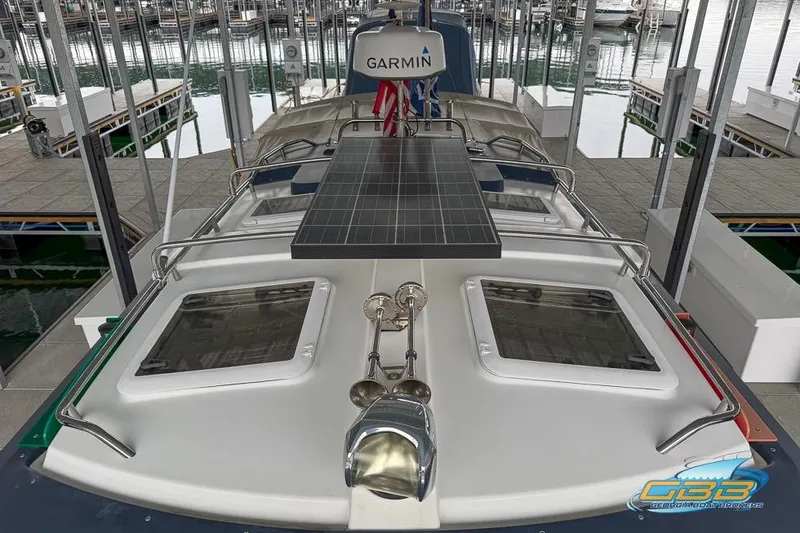 Slide: The Image of 2013 Cutwater C-28 boat with solar panel and Garmin equipment at marina dock. - 66