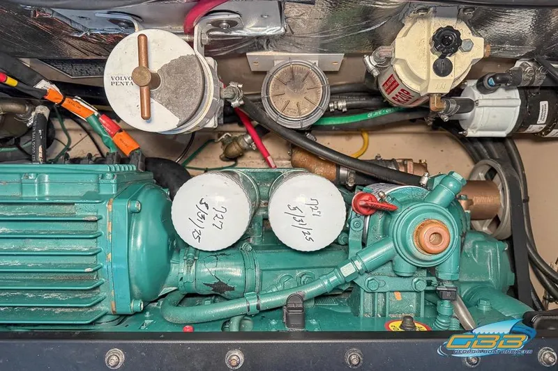 Slide: The Image of Engine compartment of a 2013 Cutwater C-28 boat with Volvo Penta components. - 49