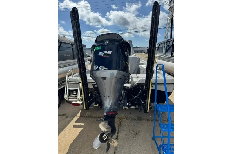 Slide: The Image of 2015 BLUEWAVE 2200 PURE boat with powerful 225 horsepower outboard motor. - 16