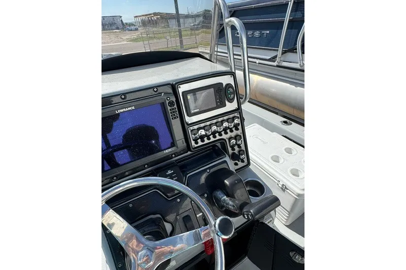 Slide: The Image of Control panel of 2015 BLUEWAVE 2200 PURE boat with navigation equipment. - 3