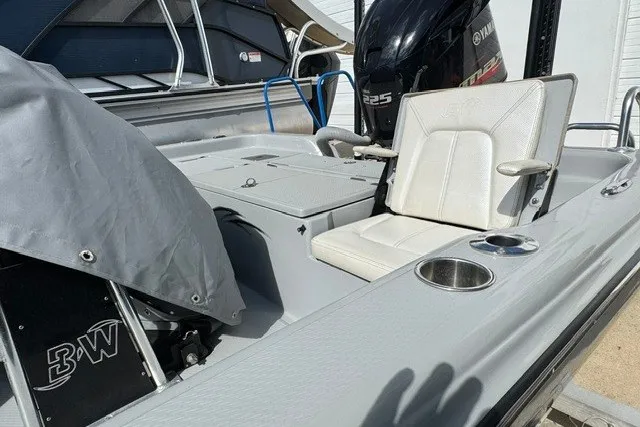 Slide: The Image of 2015 BLUEWAVE 2200 PURE boat interior with Yamaha engine and seating. - 10