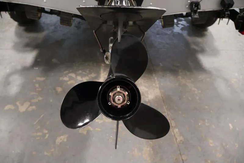 Slide: The Image of Propeller of 2004 Alumacraft Navigator 165 CS boat on concrete floor. - 41