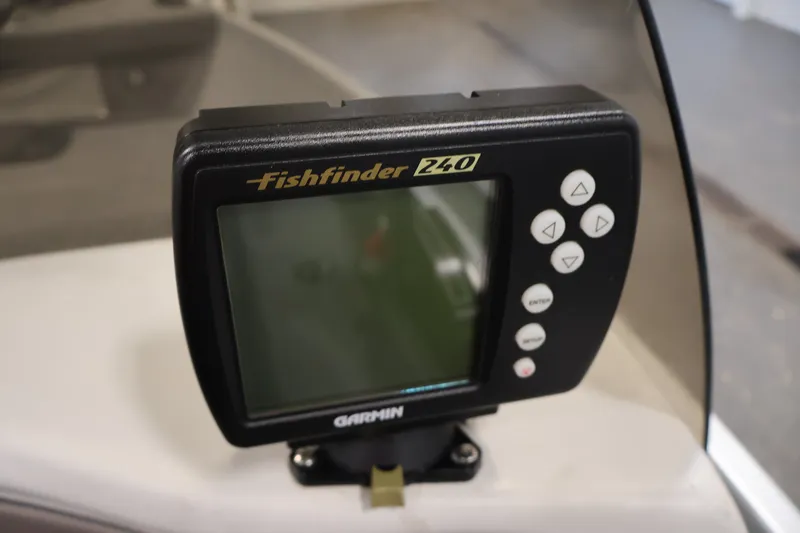 Slide: The Image of Fishfinder 240 device on 2004 Alumacraft Navigator 165 CS boat dashboard. - 28