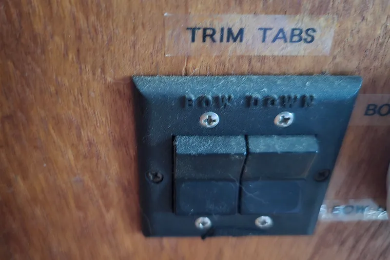 Slide: The Image of Control panel for trim tabs on 1983 Atlantic 30 LRC boat. - 24