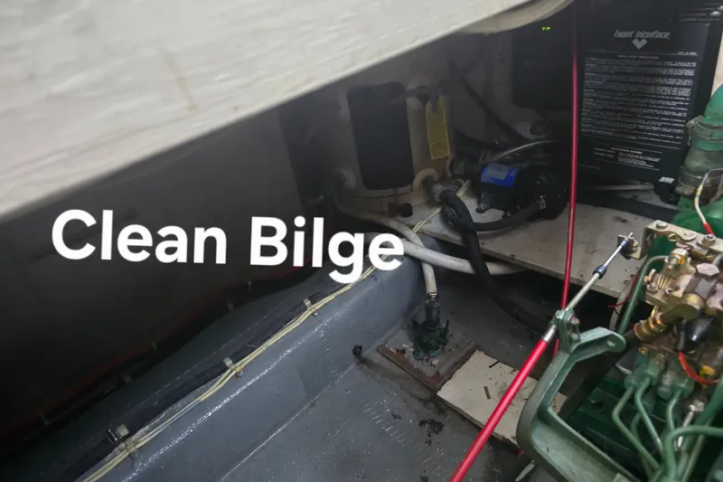 Slide: The Image of Clean bilge area of 1983 Atlantic 30 LRC boat, showcasing maintenance. - 19