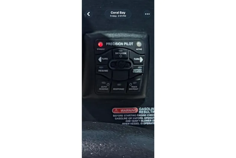 Slide: The Image of Control panel of a 2015 Sea Ray 370 Venture boat, featuring Precision Pilot system. - 55