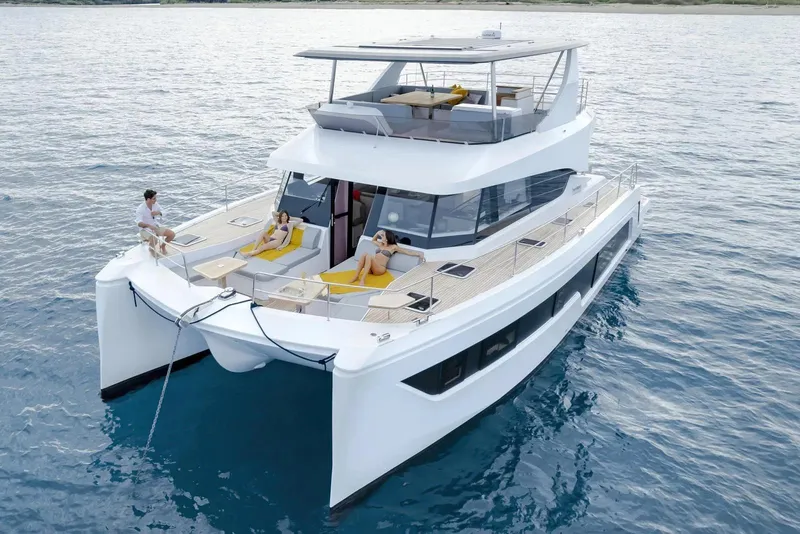The Image of Aventura 56 Motor Yacht 2026 cruising with passengers on a sunny day. - 2