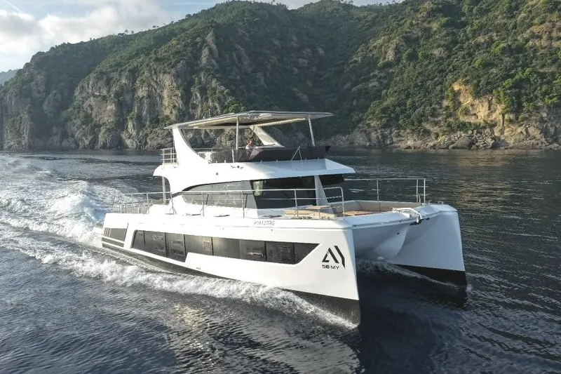 The Image of Aventura 56 Motor Yacht 2026 cruising near scenic cliffs on a calm sea. - 0