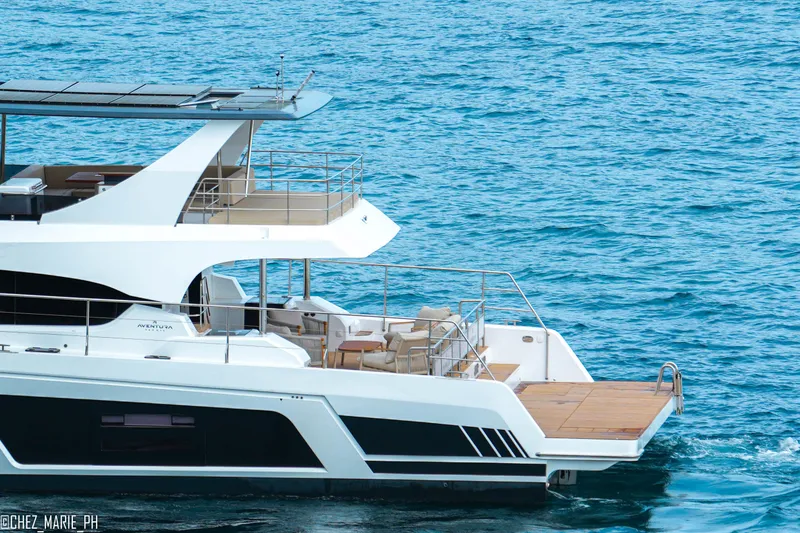 Slide: The Image of Aventura 56 Motor Yacht 2026 cruising on blue ocean waters. - 7