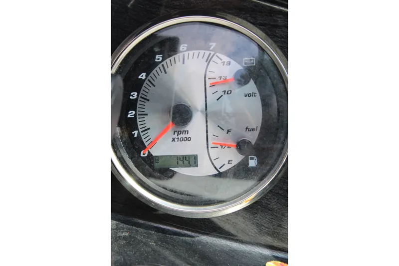 Slide: The Image of Tachometer and fuel gauge of 2020 Hurricane SunDeck 187 OB boat, showing RPM and fuel levels. - 27