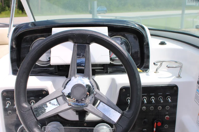 Slide: The Image of Steering wheel and dashboard of 2020 Hurricane SunDeck 187 OB boat. - 25