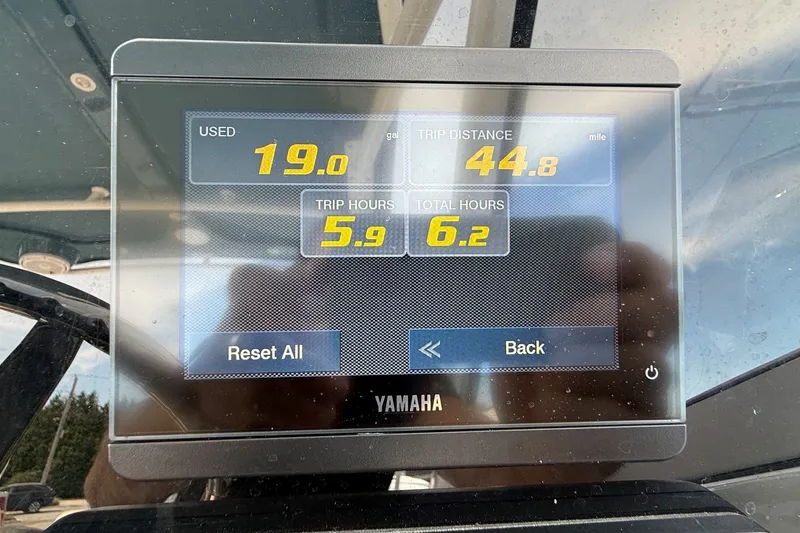 Slide: The Image of Yamaha display showing trip data on 2025 Edgewater 248CX Crossover boat. - 22