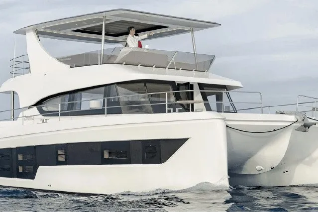 The Image of 2026 Aventura 56 Motor Yacht cruising on open water. - 0