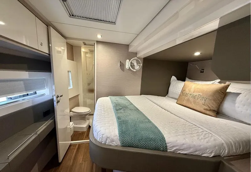 Slide: The Image of Luxurious bedroom in 2025 Aventura 56 Motor Yacht with ensuite bathroom. - 8