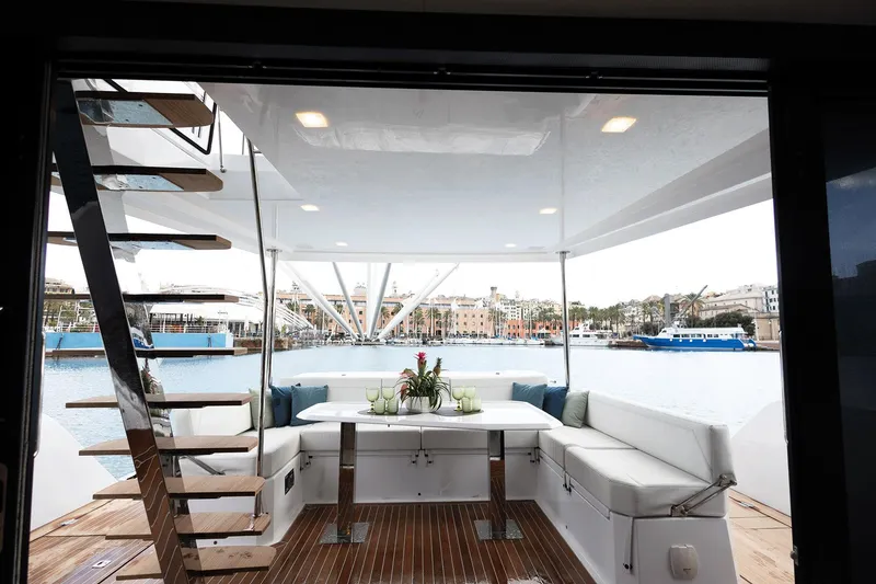 Slide: The Image of Luxurious 2026 Aventura 38 Motor Yacht interior with elegant seating and waterfront view. - 12