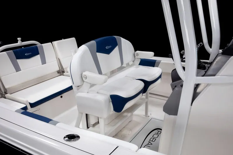 Slide: The Image of Manufacturer Provided Image: 2026 Robalo R232 Explorer boat interior with white and blue seating. - 10