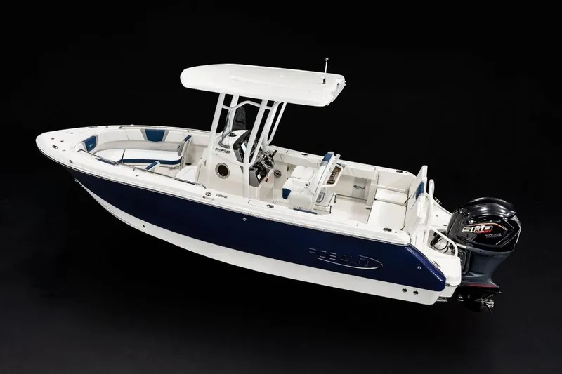 Slide: The Image of Manufacturer Provided Image: 2026 Robalo R232 Explorer boat with Yamaha engine, sleek design, white and blue color scheme. - 6