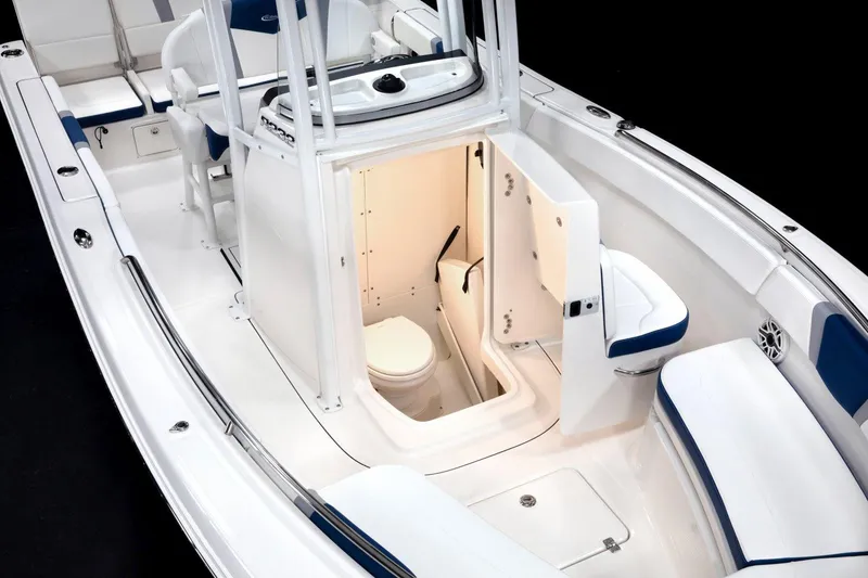Slide: The Image of Manufacturer Provided Image: 2026 Robalo R232 Explorer boat interior with open cabin and seating. - 8