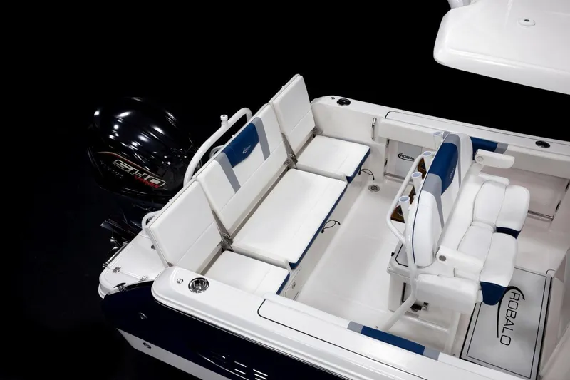 Slide: The Image of Manufacturer Provided Image: 2026 Robalo R232 Explorer boat interior with seating and engine detail. - 11