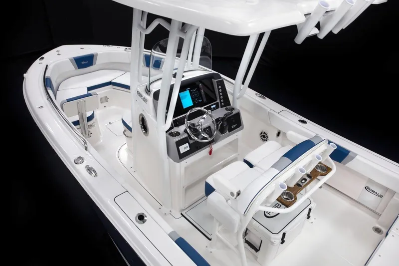 Slide: The Image of Manufacturer Provided Image: 2026 Robalo R232 Explorer boat interior with modern dashboard and seating. - 9